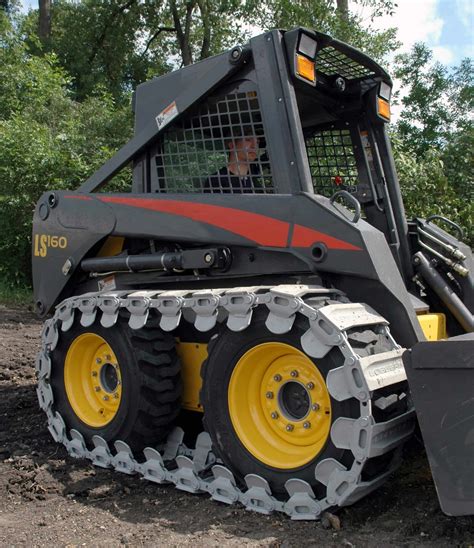 loegering over the tire skid steer tracks|loegering skid steer tracks.